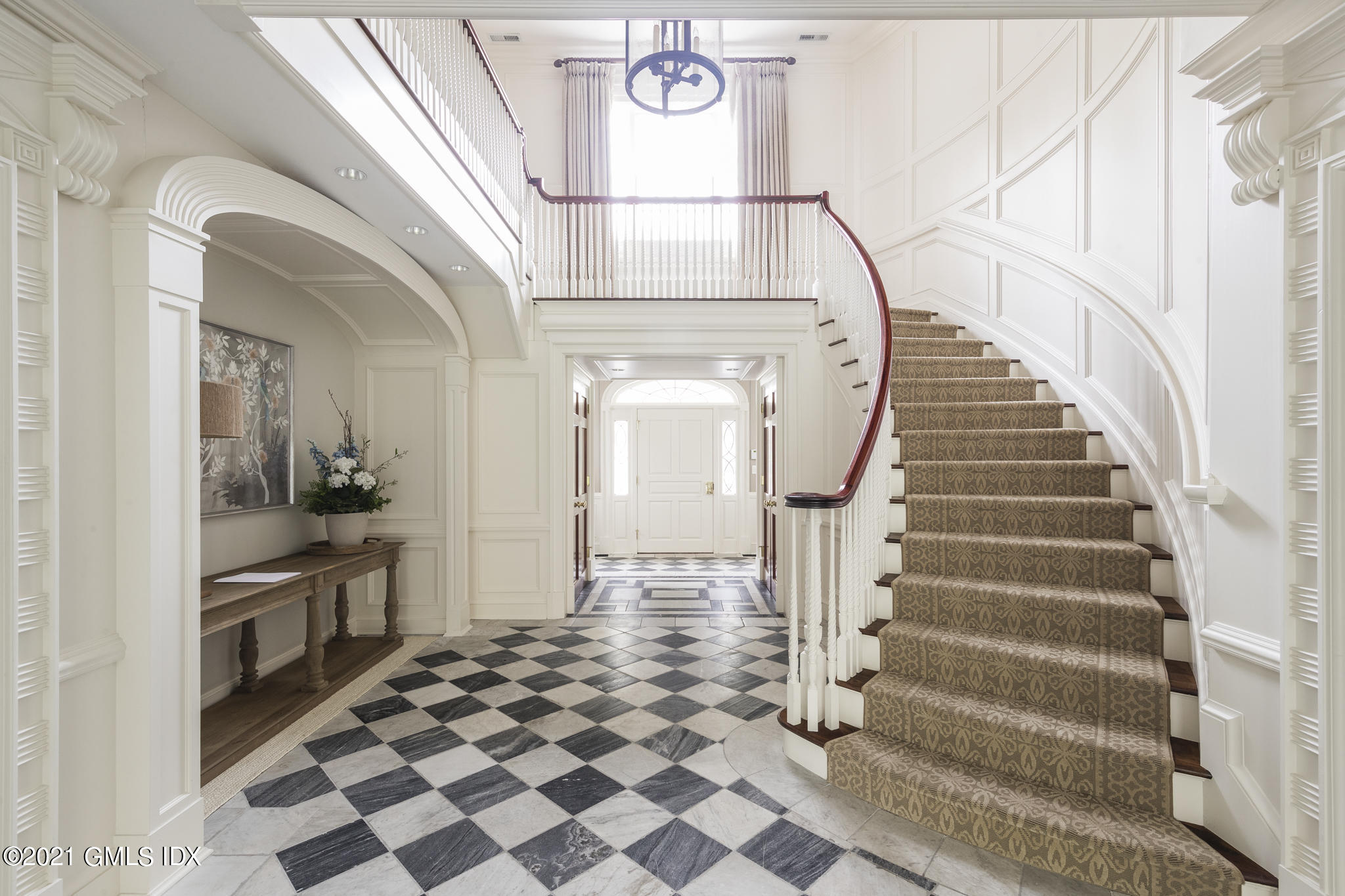 74 Upper Cross Road Greenwich, CT 06831 - Photo 5 of 40 a view of entryway and hall with wooden floor