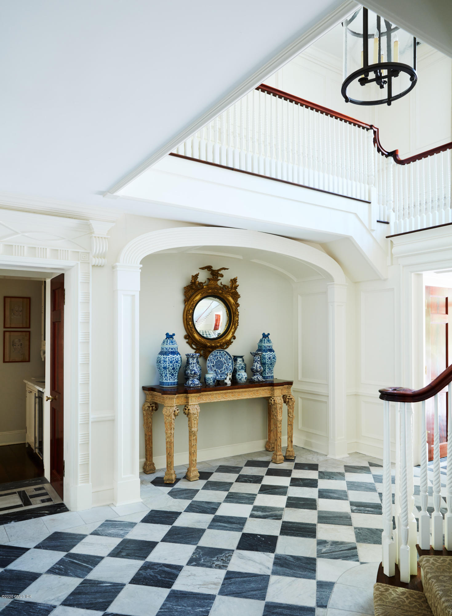 74 Upper Cross Road Greenwich, CT 06831 - Photo 6 of 40 a view of a center island and a car windows