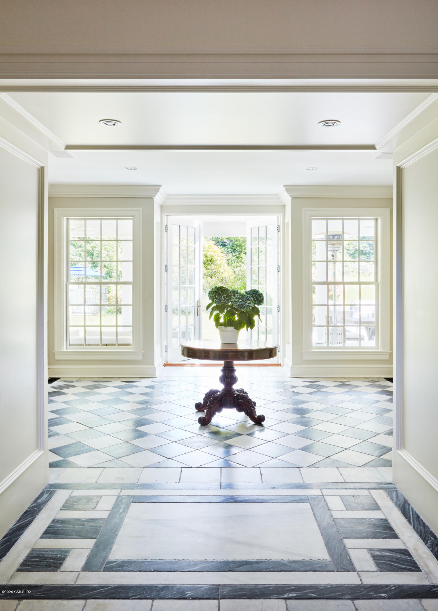 74 Upper Cross Road Greenwich, CT 06831 - Photo 8 of 40 a view of entryway and hall with wooden floor