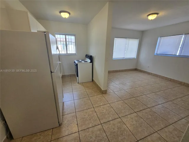 a view of a porch with wooden floor and stairs