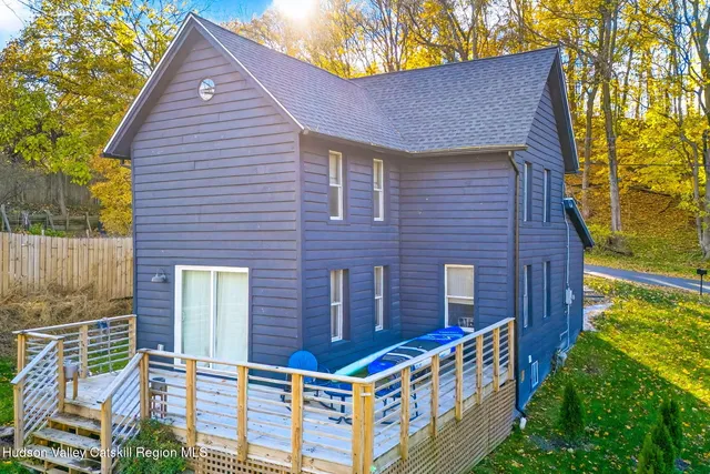 a front view of a house with balcony