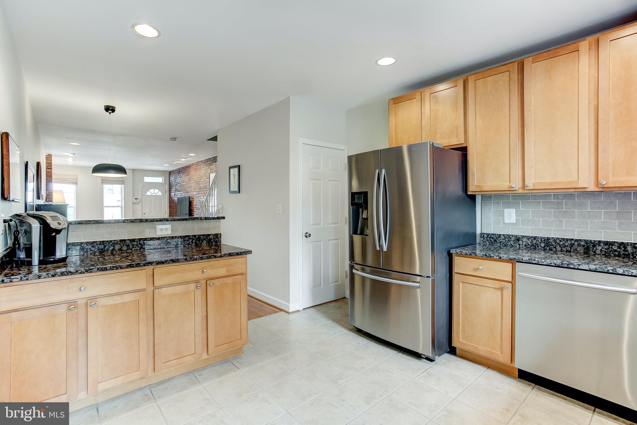 3638 Keswick Road Baltimore, MD 21211 - Photo 15 of 35 Granite counters and stainless steel appliances
