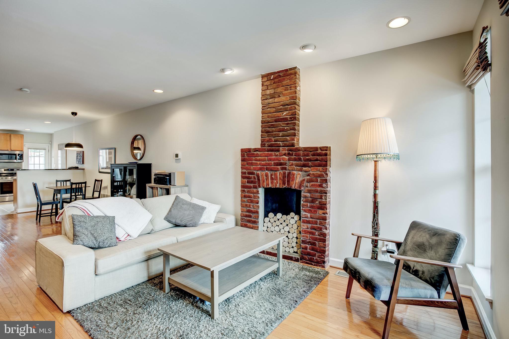3638 Keswick Road Baltimore, MD 21211 - Photo 35 of 35 Open floor plan with decorative fireplace