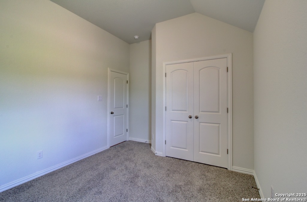 11910 Lofted Bloom Schertz, TX 78154 - Photo 20 of 26 an empty room with closet area
