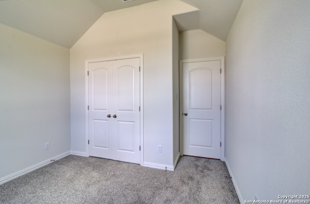 11910 Lofted Bloom Schertz, TX 78154 - Photo 7 of 26 a view of an empty room