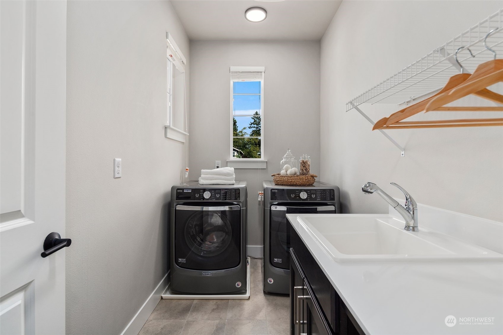 22322 43rd Drive Southeast Bothell, WA 98021 - Photo 23 of 40 a kitchen with a stove and a sink