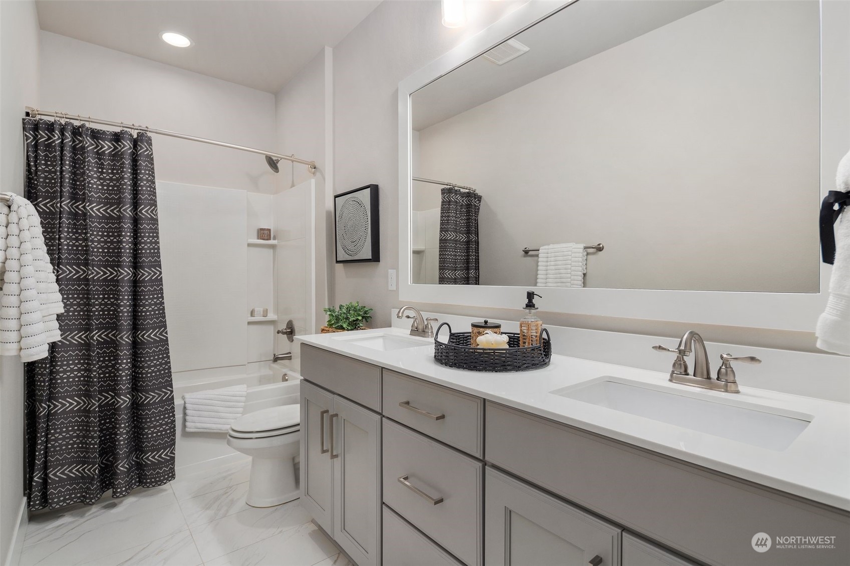 22322 43rd Drive Southeast Bothell, WA 98021 - Photo 24 of 40 a bathroom with a double vanity sink toilet and shower
