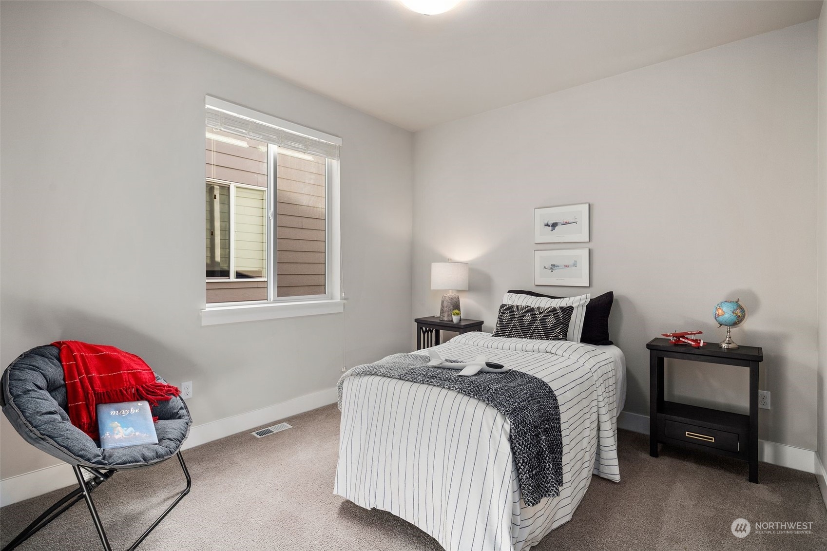 22322 43rd Drive Southeast Bothell, WA 98021 - Photo 25 of 40 a bedroom with a bed chair and window