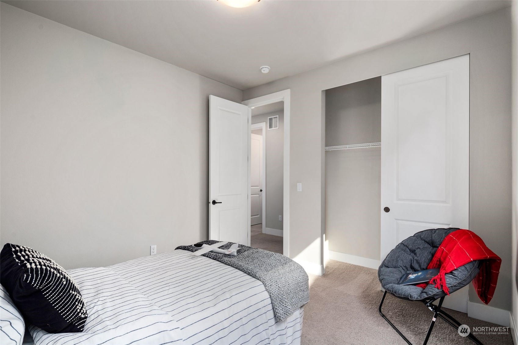 22322 43rd Drive Southeast Bothell, WA 98021 - Photo 26 of 40 a bedroom with a bed and a window