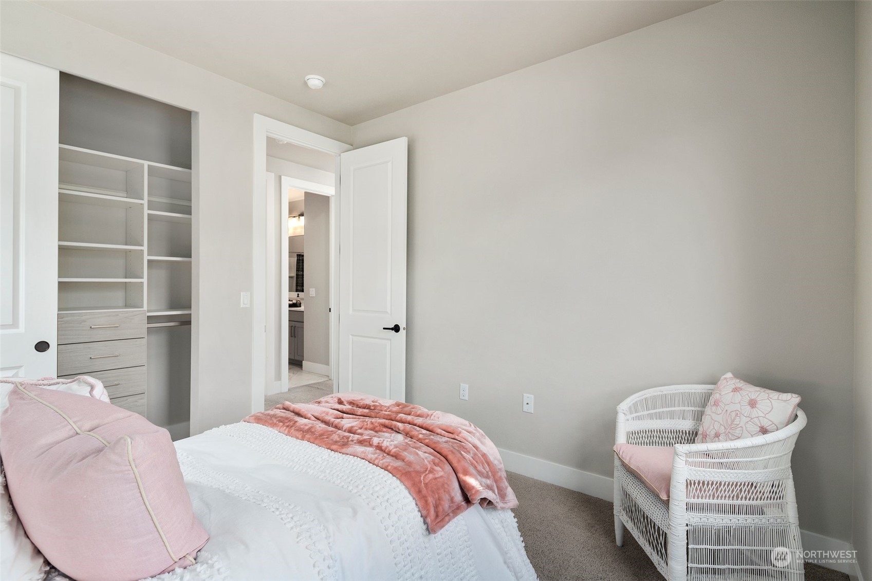 22322 43rd Drive Southeast Bothell, WA 98021 - Photo 28 of 40 a bedroom with a bed and a chair