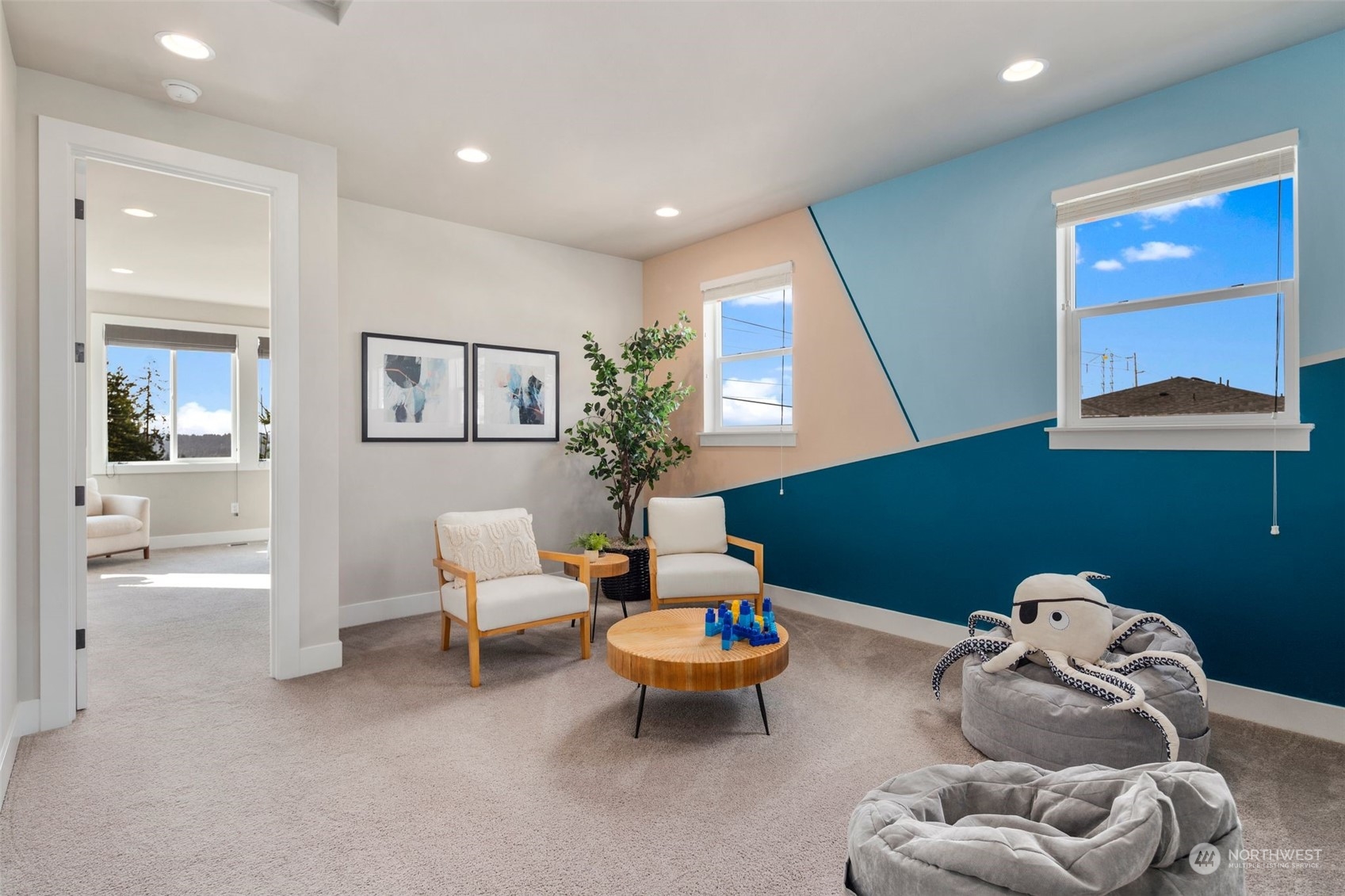 22322 43rd Drive Southeast Bothell, WA 98021 - Photo 29 of 40 a living room with furniture and a large window