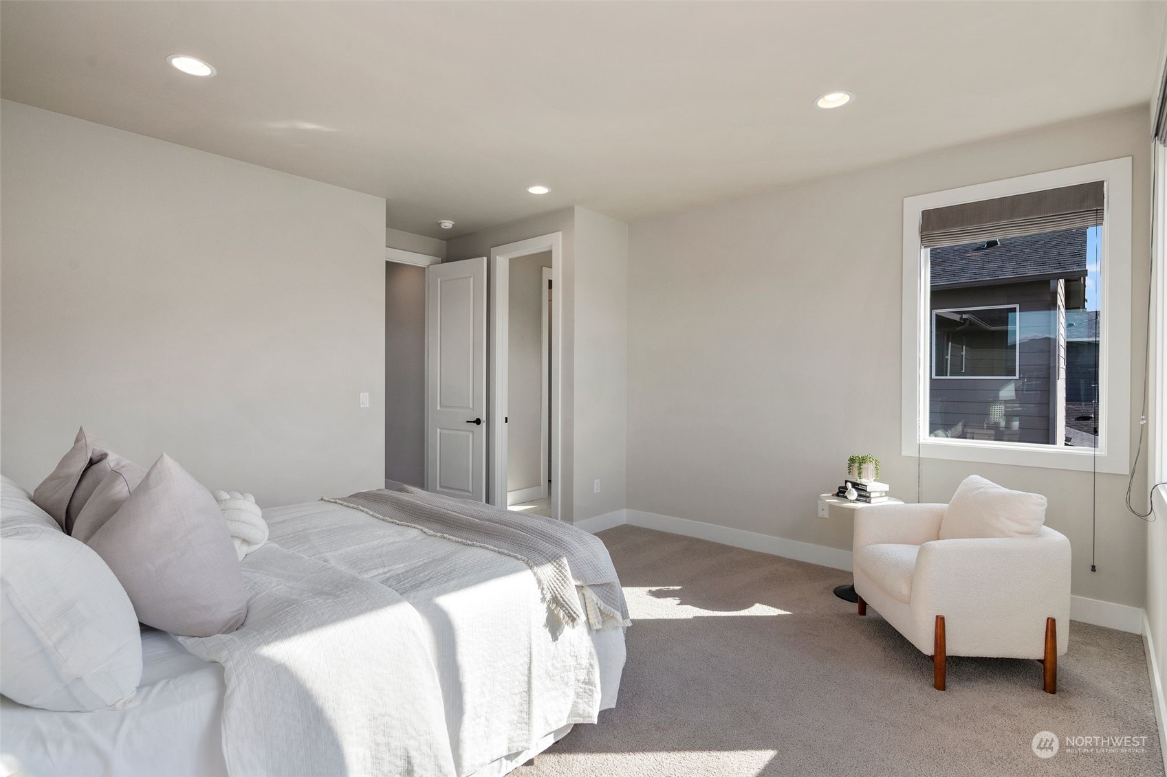 22322 43rd Drive Southeast Bothell, WA 98021 - Photo 31 of 40 a spacious bedroom with a bed and furniture