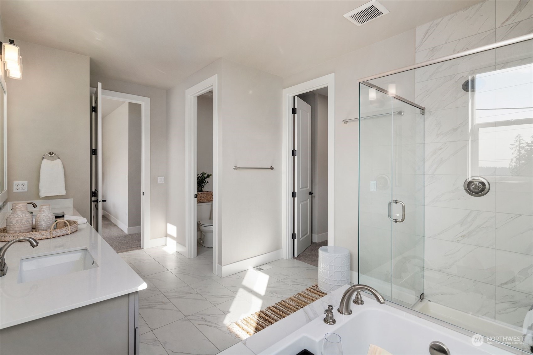 22322 43rd Drive Southeast Bothell, WA 98021 - Photo 35 of 40 a bathroom with a sink a toilet and shower