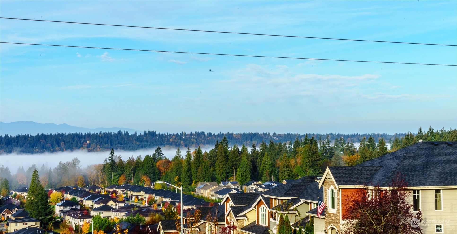 22322 43rd Drive Southeast Bothell, WA 98021 - Photo 40 of 40 a view of a lake with a table and chairs