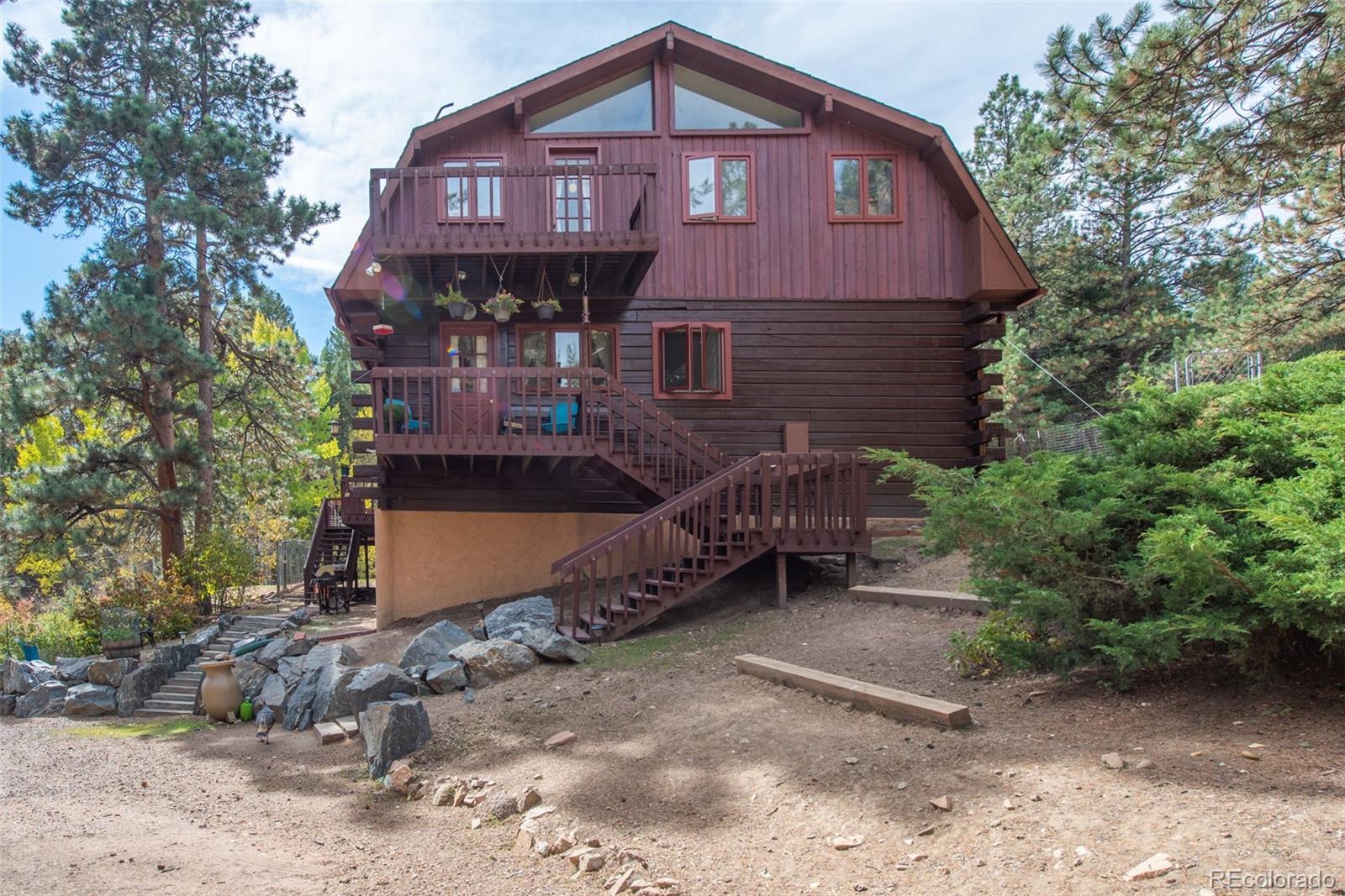 601 Pika Road Boulder, CO 80302 - Photo 2 of 30 a front view of a house with garden