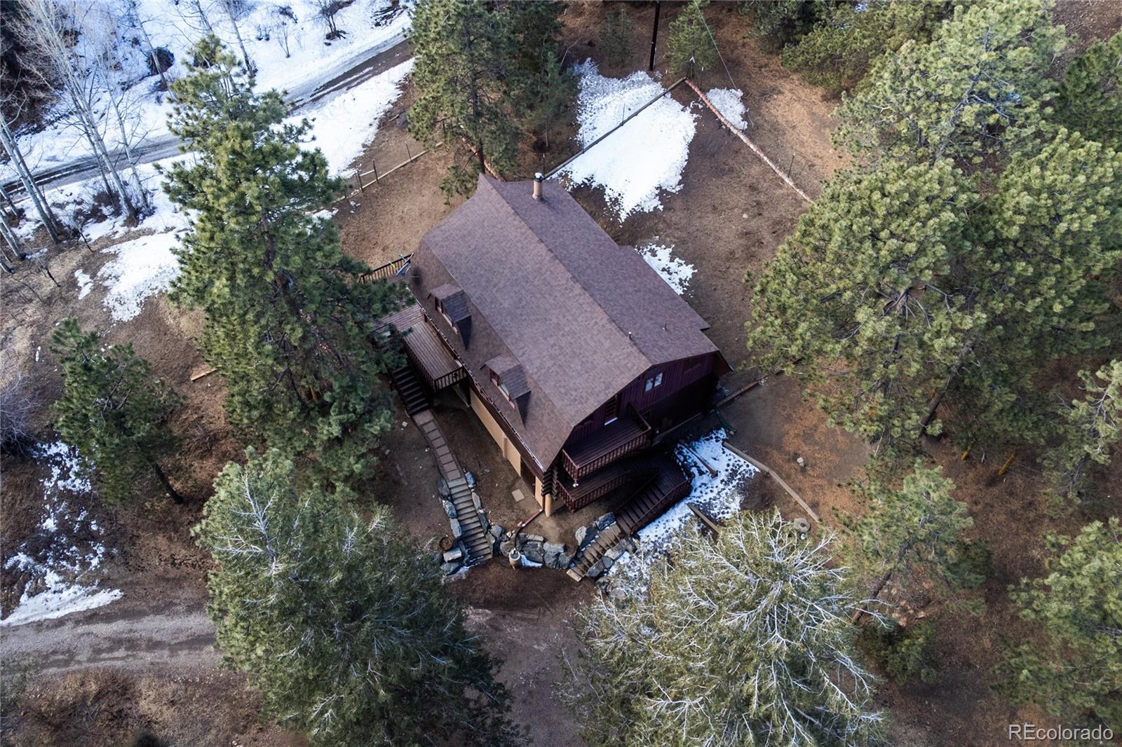 601 Pika Road Boulder, CO 80302 - Photo 28 of 30 an aerial view of a house with a yard