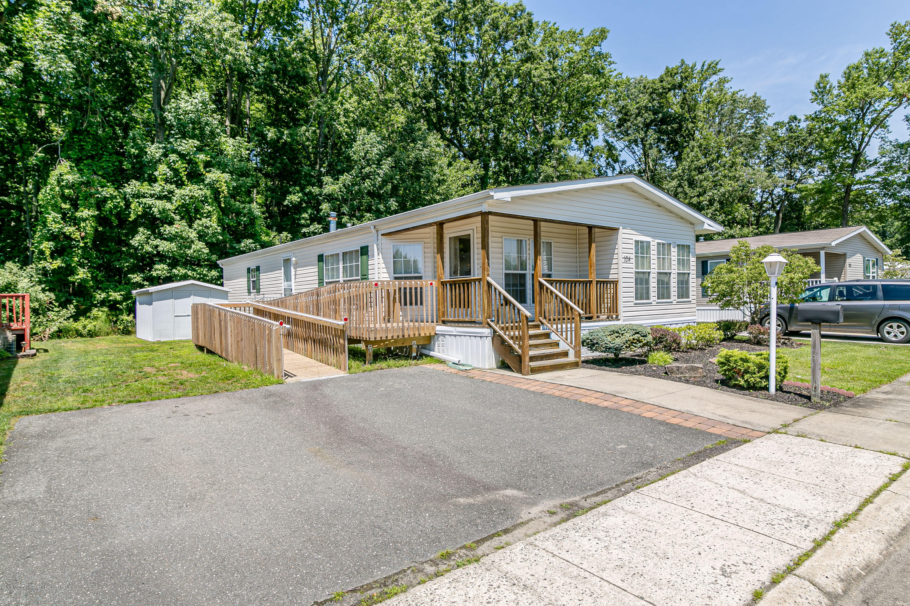 104 Woody Road Freehold, NJ 07728 - Photo 2 of 16 002104 WOODY