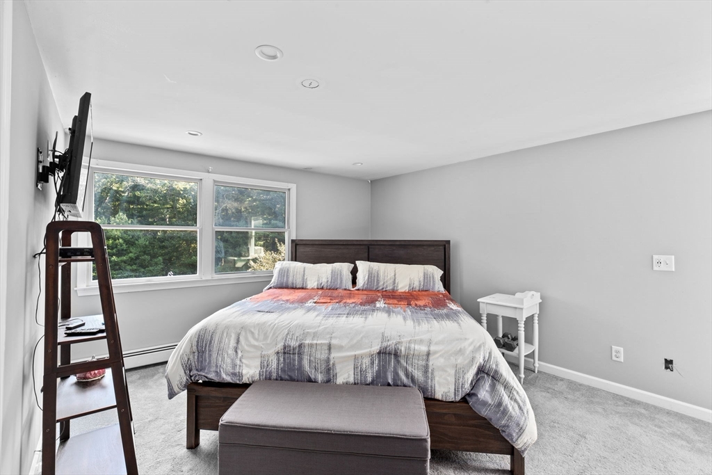518 County Road Wareham, MA 02576 - Photo 15 of 32 a bedroom with a bed and a large window