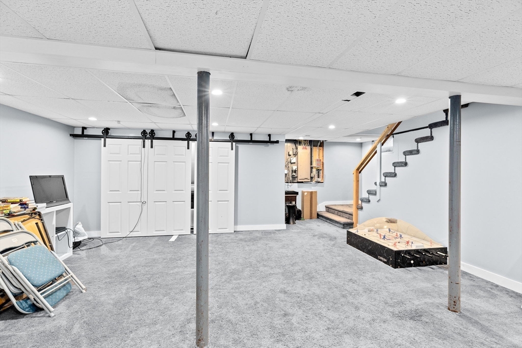 518 County Road Wareham, MA 02576 - Photo 19 of 32 a view of a livingroom with entryway stairs and a ceiling fan