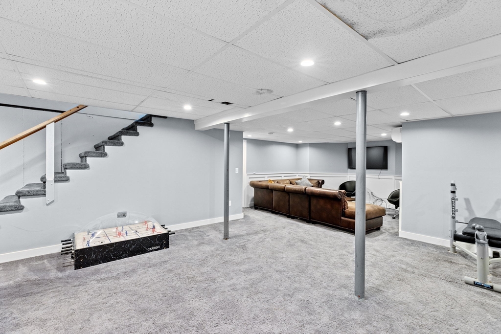 518 County Road Wareham, MA 02576 - Photo 21 of 32 a living room with furniture and a chandelier