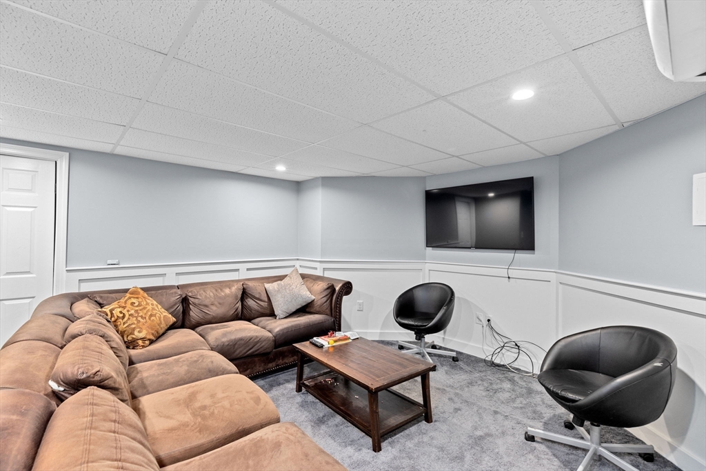 518 County Road Wareham, MA 02576 - Photo 22 of 32 a living room with furniture and a flat screen tv