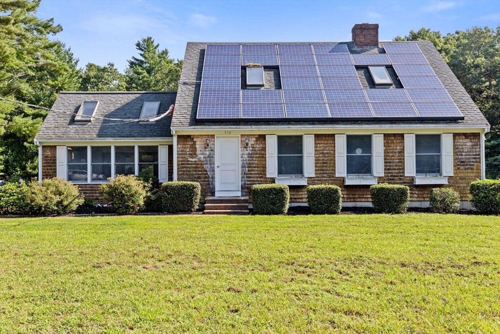 518 County Road Wareham, MA 02576 - Photo 26 of 32 a view of a brick house with a yard