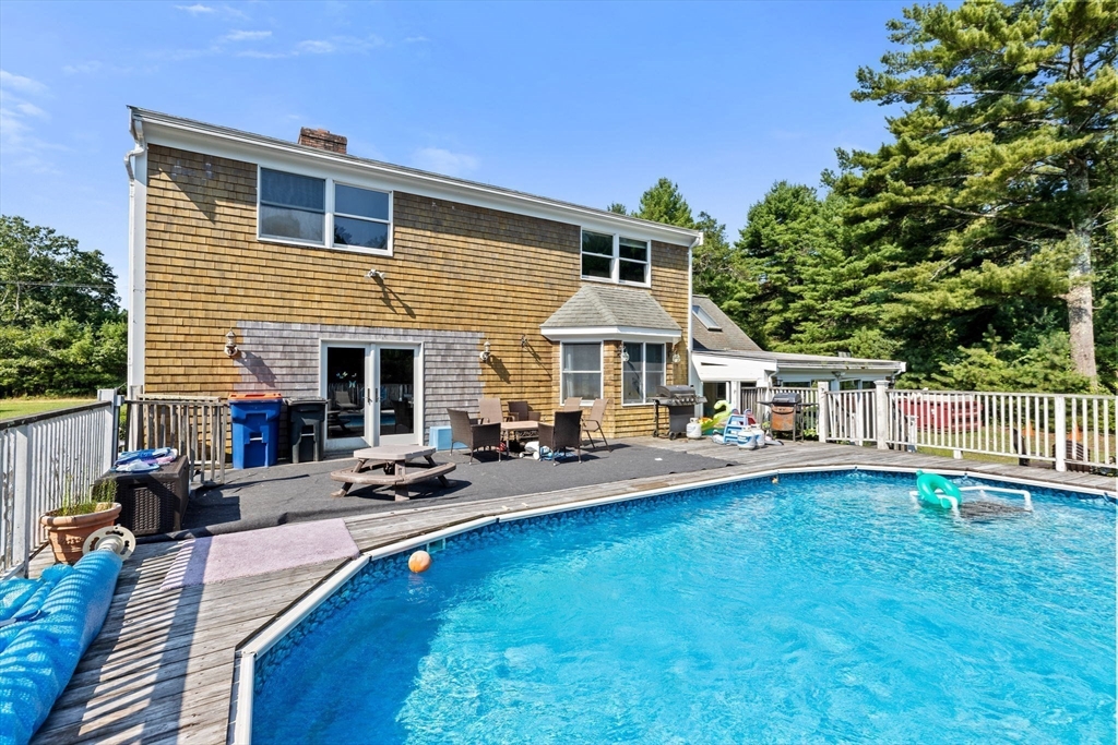 518 County Road Wareham, MA 02576 - Photo 3 of 32 a view of a house with swimming pool and sitting area