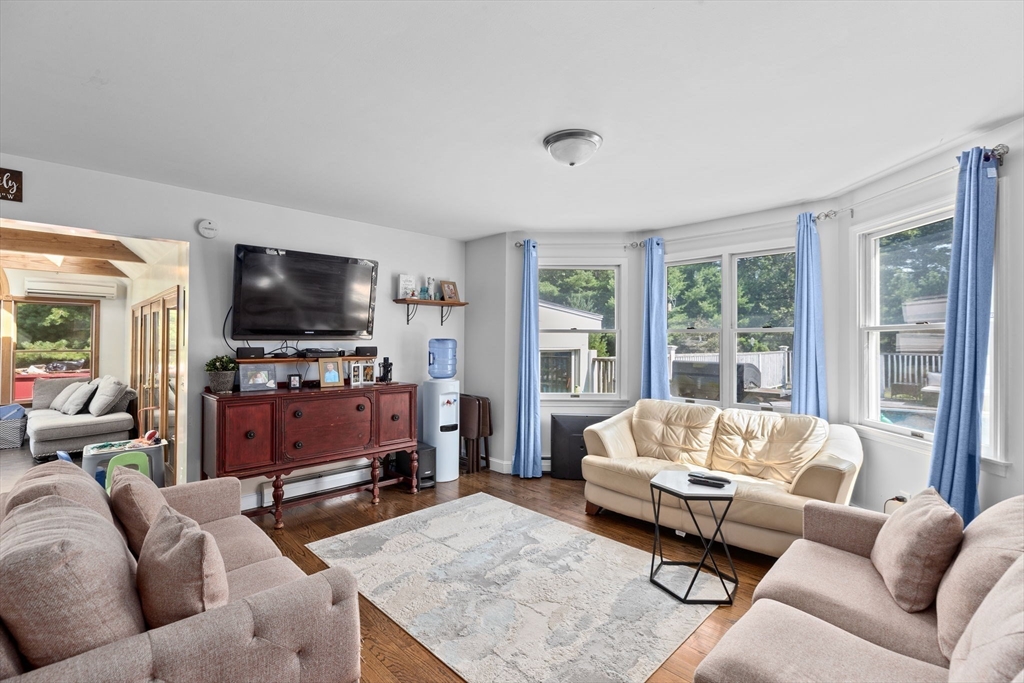 518 County Road Wareham, MA 02576 - Photo 6 of 32 a living room with furniture and a flat screen tv