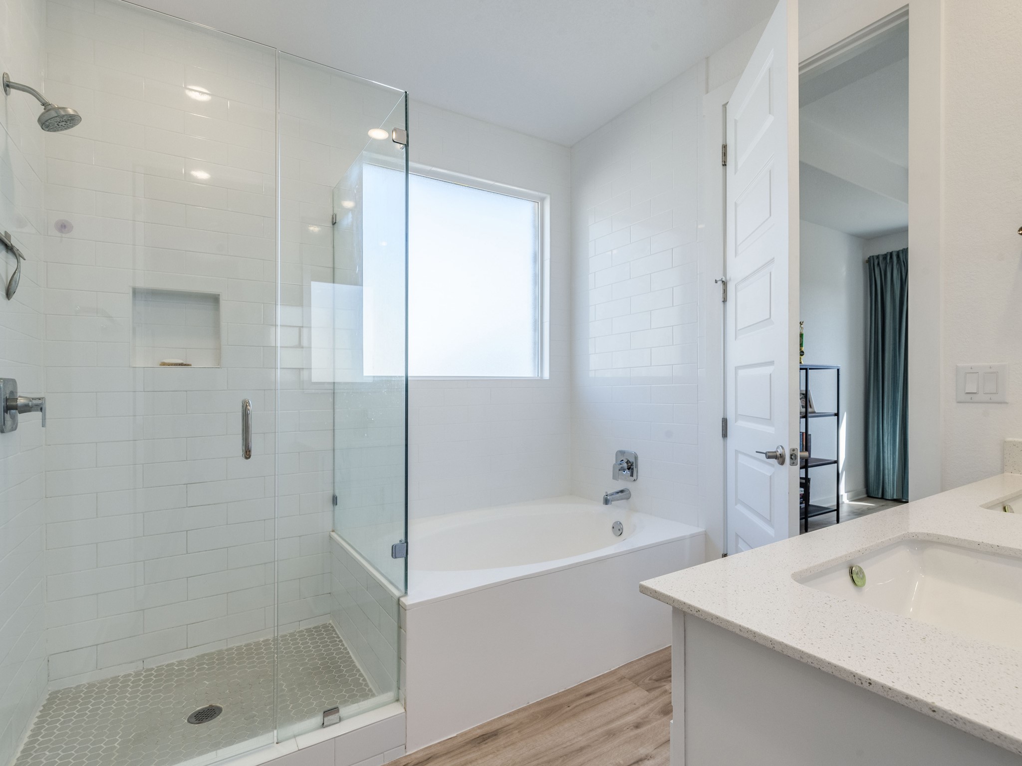 2132 Centerline Lane Georgetown, TX 78628 - Photo 13 of 30 Frameless glass walk-in shower, subway tile surrounds, hexagonal shower flooring and paired with a deep soaking tub