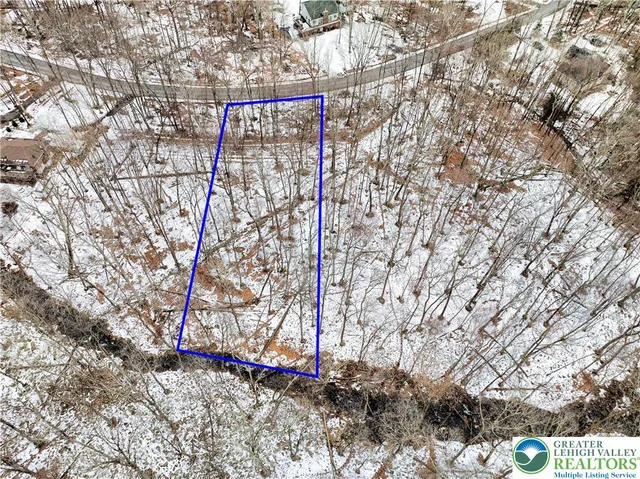 a view of a yard with an outdoor space