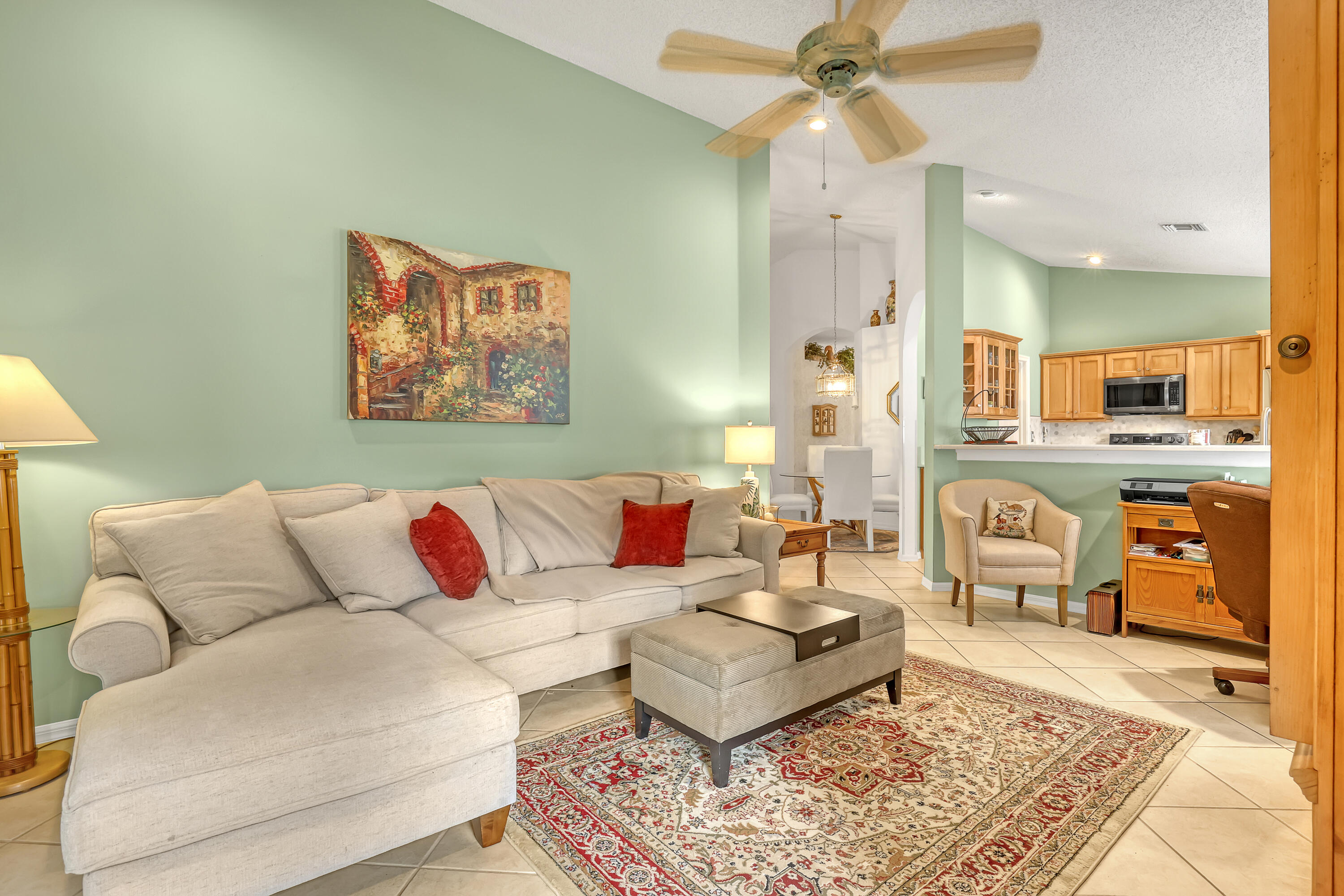6995 Southeast Cutler Trail Stuart, FL 34997 - Photo 12 of 41 a living room with furniture and wooden floor