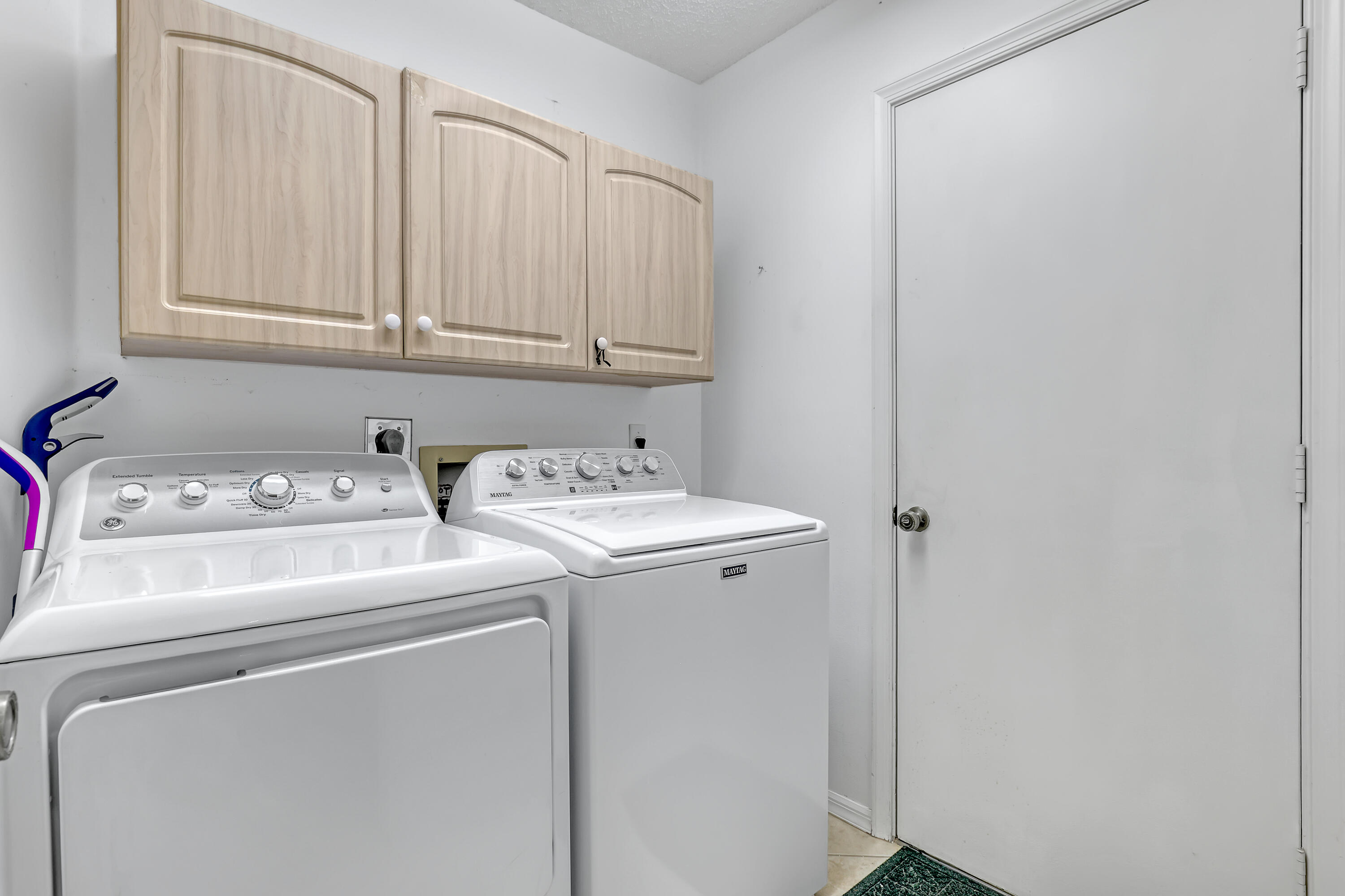 6995 Southeast Cutler Trail Stuart, FL 34997 - Photo 28 of 41 a utility room with dryer and washer