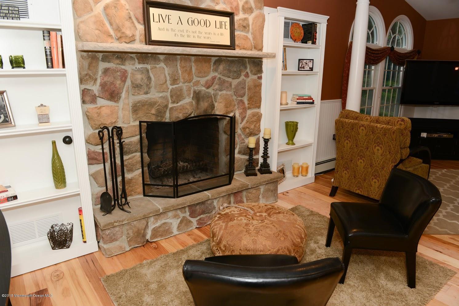 17 Pelican Road Middletown, NJ 07748 - Photo 13 of 45 stone wood burning fireplace