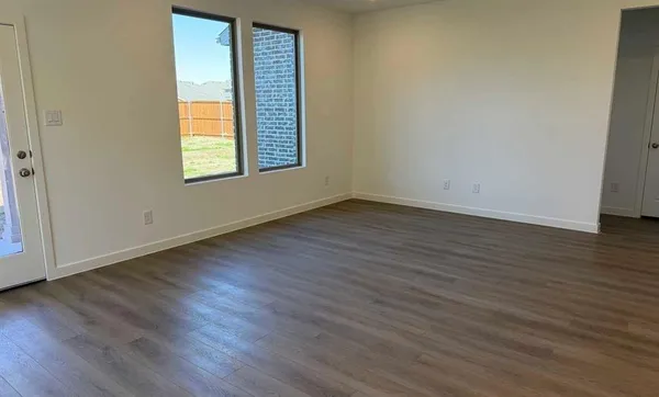a bathroom with a double vanity sink mirror and shower