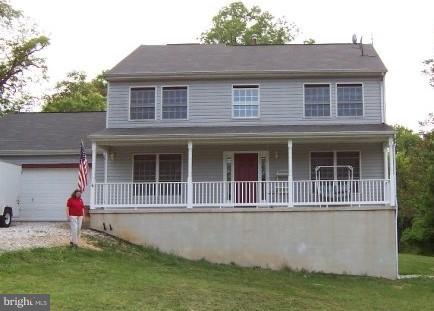 1222 Furnace Road Linthicum Heights, MD 21090 - Photo 1 of 9 a house view with a garden space