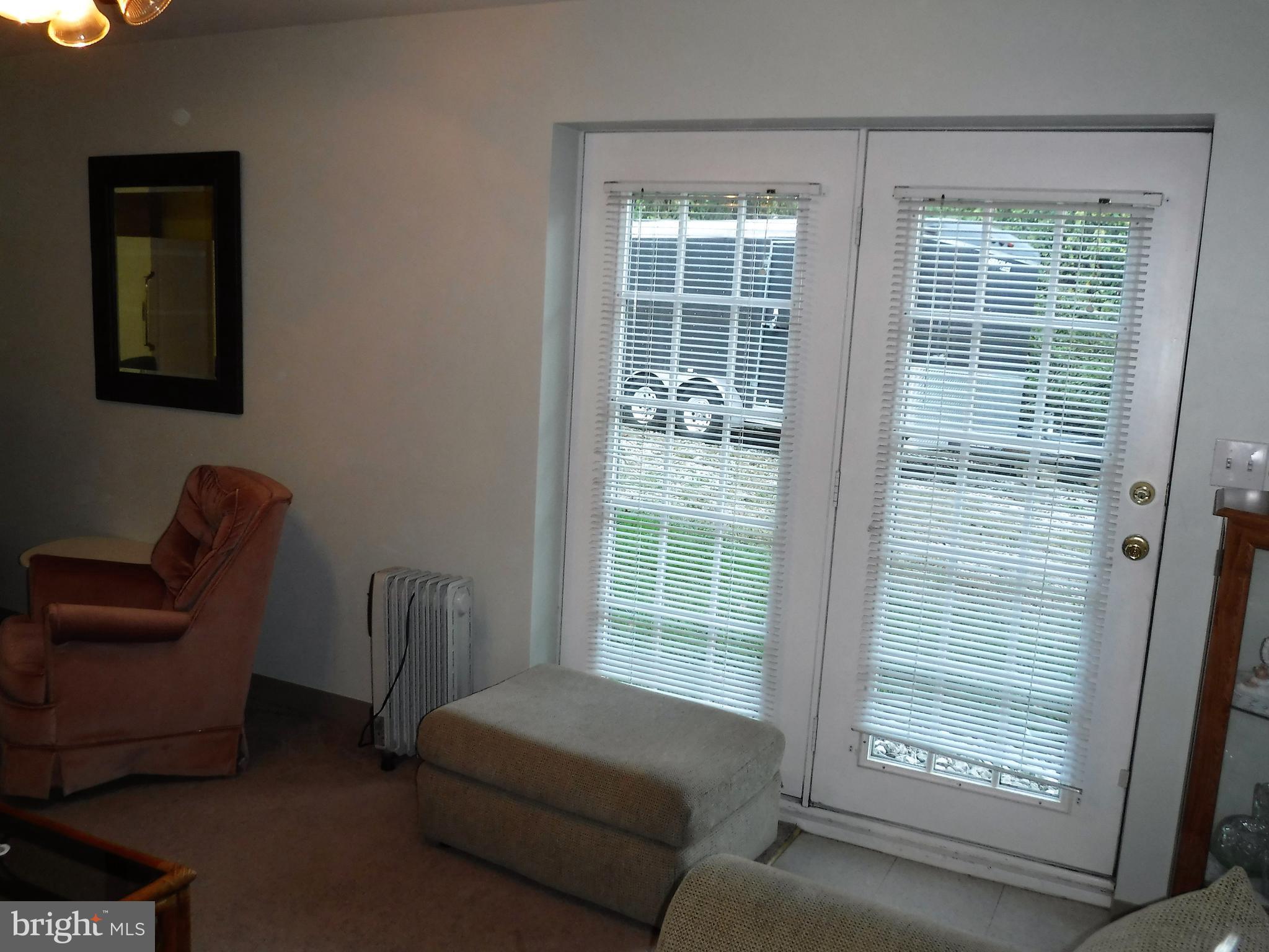1222 Furnace Road Linthicum Heights, MD 21090 - Photo 2 of 9 a living room with furniture and a window