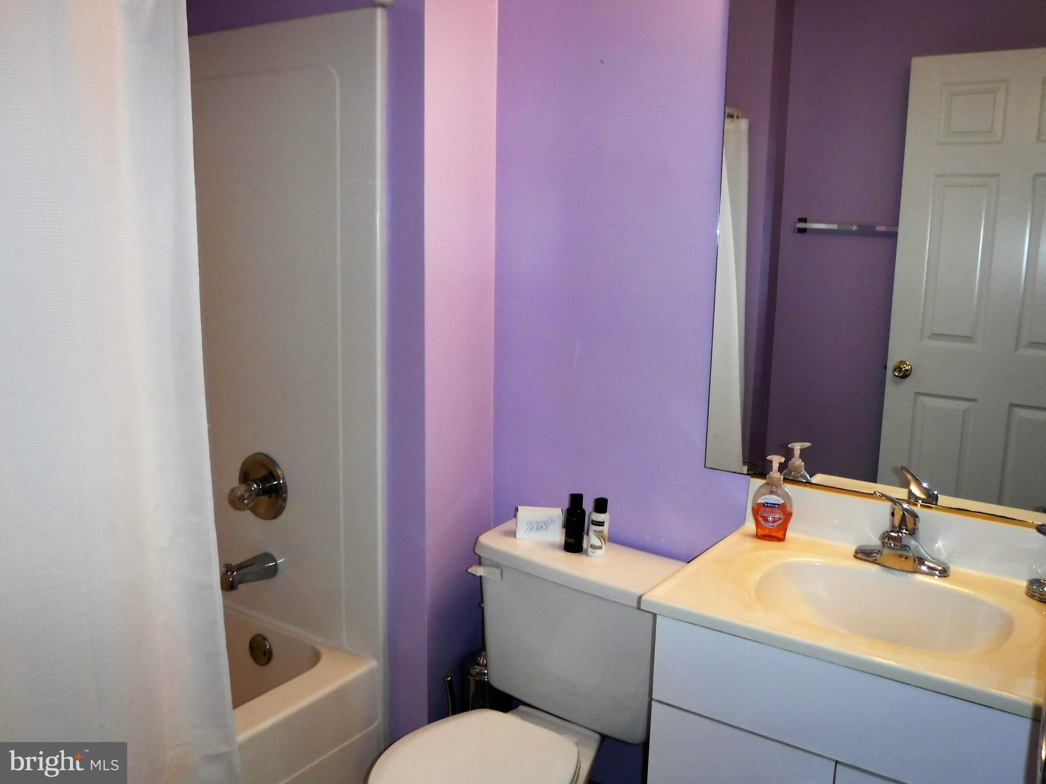 1222 Furnace Road Linthicum Heights, MD 21090 - Photo 9 of 9 a bathroom with a sink a toilet and shower