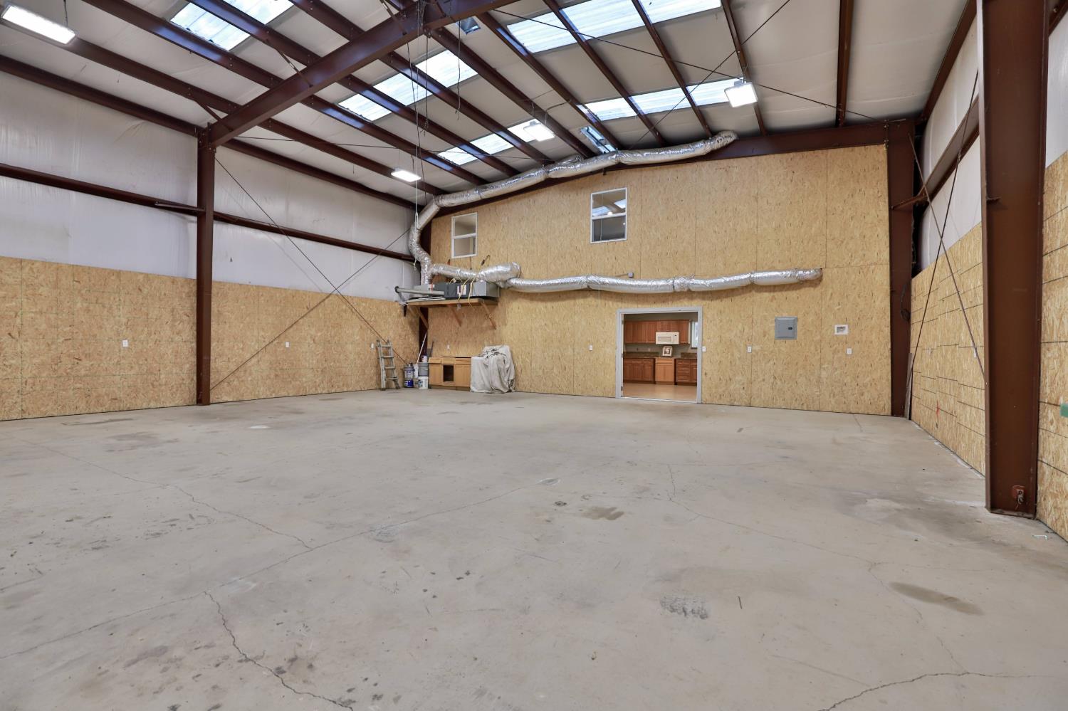 4773 Jacarah Road Placerville, CA 95667 - Photo 66 of 94 HUGE workshop through the 2 roll-up doors.