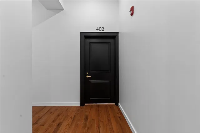 a front view of a building with a lot of windows