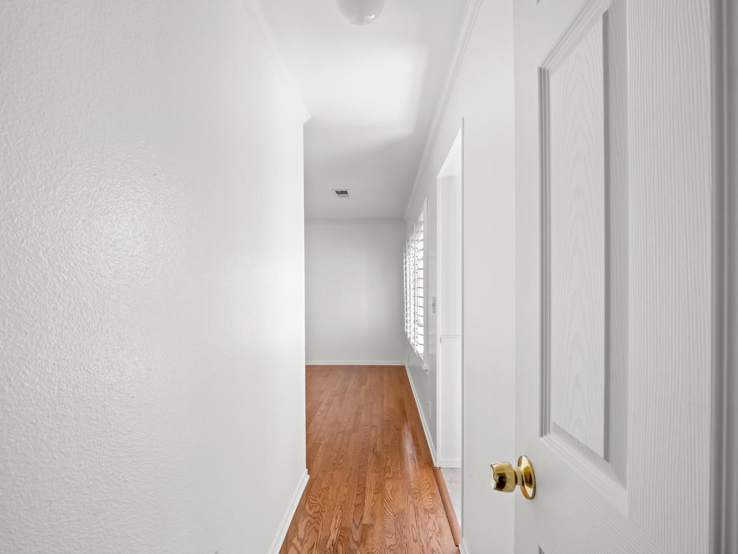 873 Cedar Lane Lemoore, CA 93245 - Photo 25 of 41 a view of a room with wooden floor