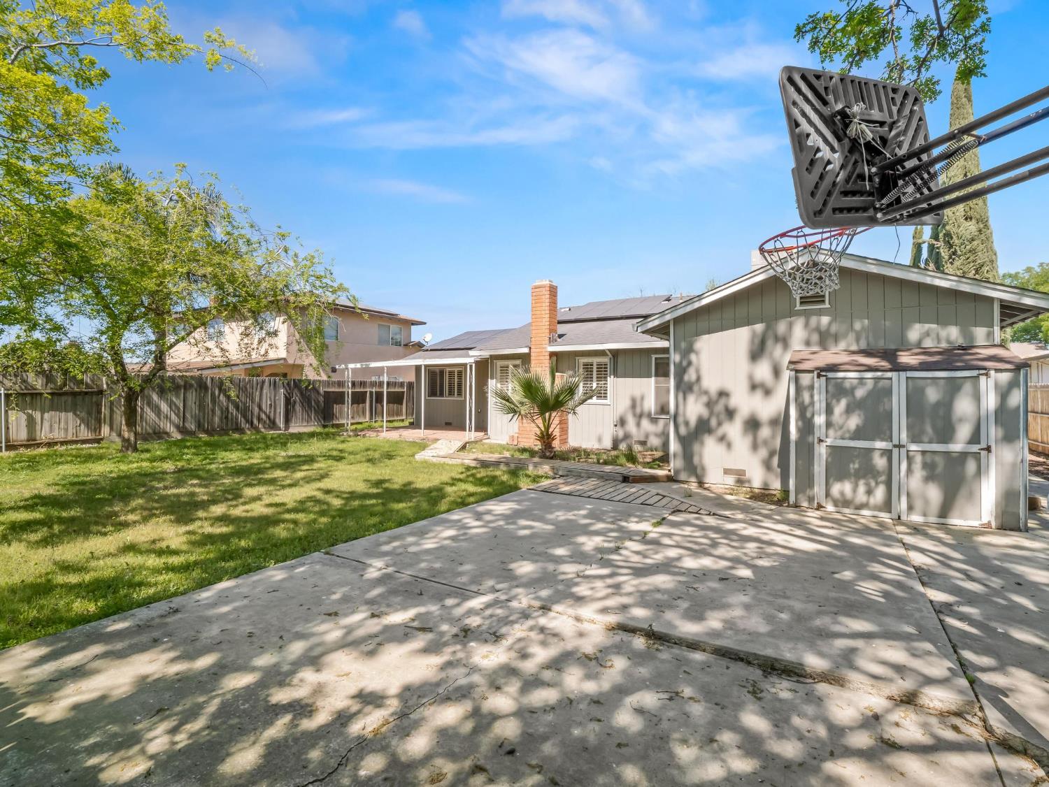 873 Cedar Lane Lemoore, CA 93245 - Photo 5 of 41 a front view of a house with a yard