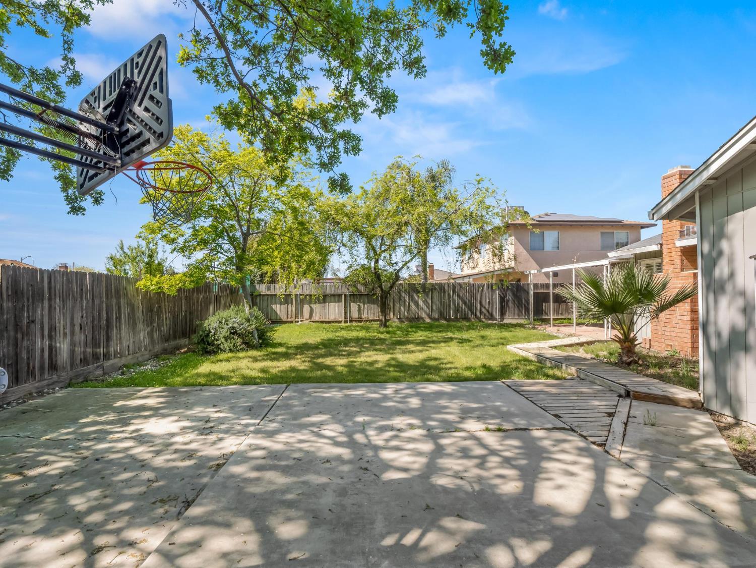 873 Cedar Lane Lemoore, CA 93245 - Photo 6 of 41 a view of backyard of house