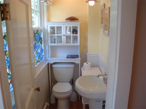 72 Cleveland Way Wareham, MA 02532 - Photo 12 of 27 a bathroom with a toilet sink and mirror