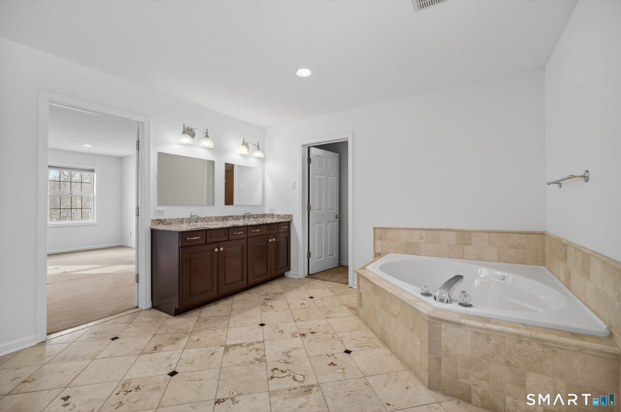 149 Ford Road Woodbridge, CT 06525 - Photo 23 of 41 PRIMARY BATH WITH WHIRLPOOL TUB