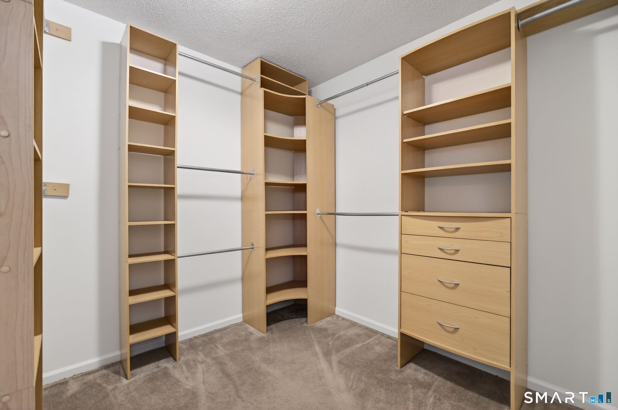 149 Ford Road Woodbridge, CT 06525 - Photo 30 of 47 WALK-IN CLOSET FOR PRIMARY BEDROOM