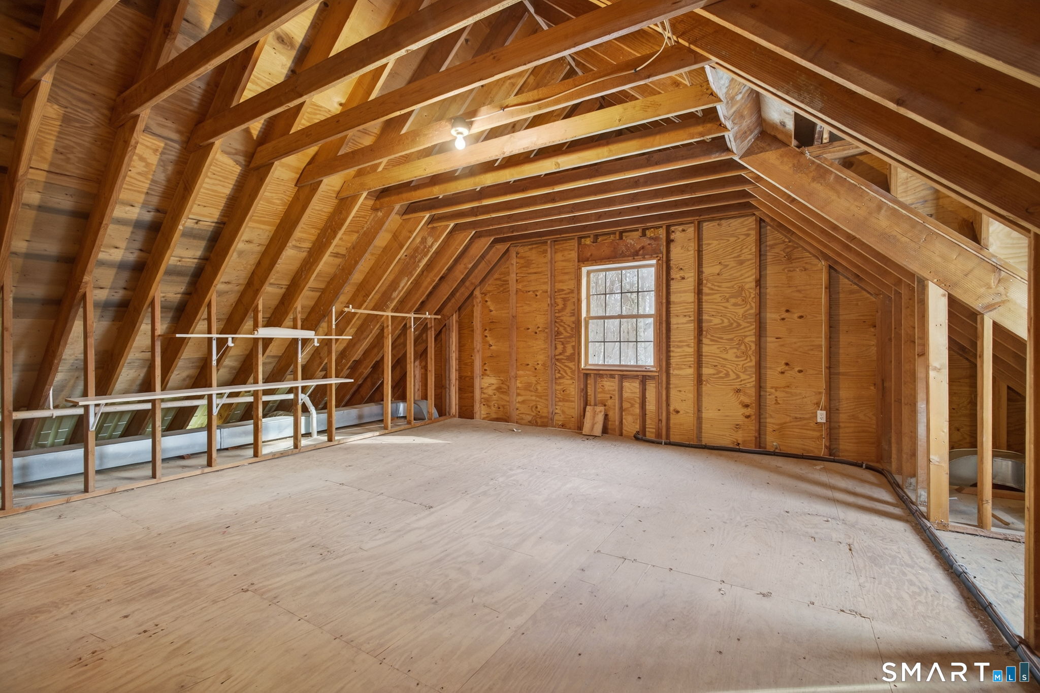 149 Ford Road Woodbridge, CT 06525 - Photo 42 of 47 UNFINISHED WALK-UP ATTIC. ALREADY FRAMED FOR FINISHING!