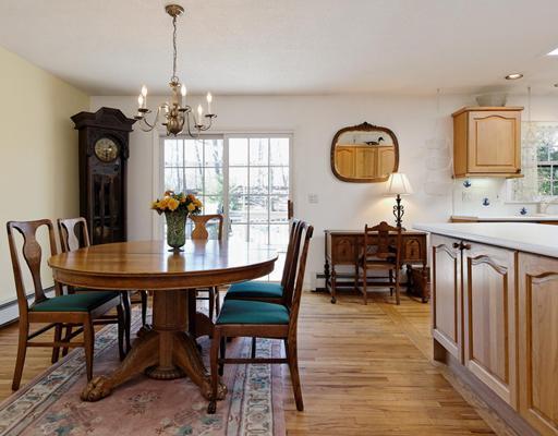242 Pemberwick Road Greenwich, CT 06831 - Photo 3 of 10 a view of a dining room with furniture window and wooden floor