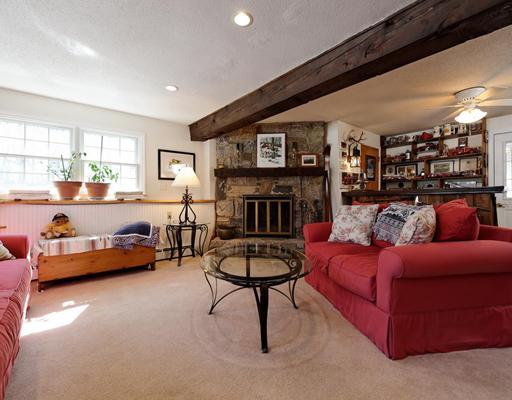 242 Pemberwick Road Greenwich, CT 06831 - Photo 5 of 10 a living room with furniture and a fireplace