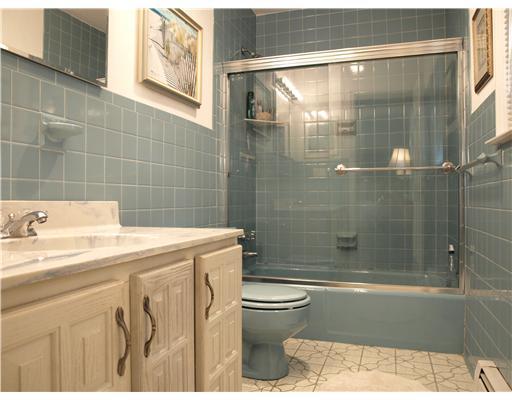 242 Pemberwick Road Greenwich, CT 06831 - Photo 7 of 10 a bathroom with a sink toilet and shower