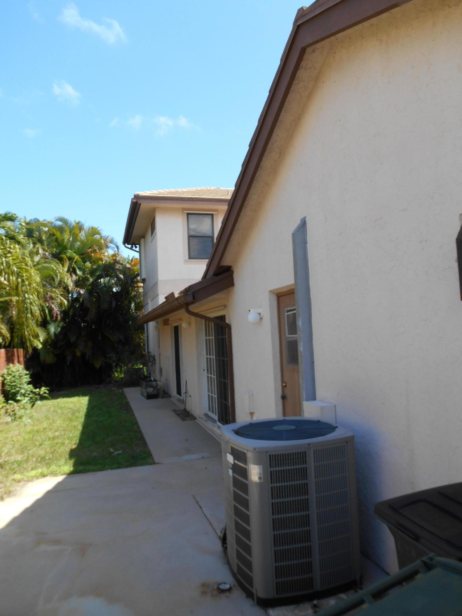 7280 Northwest 4th Avenue Boca Raton, FL 33487 - Photo 7 of 23 Side Yard behind fenced area